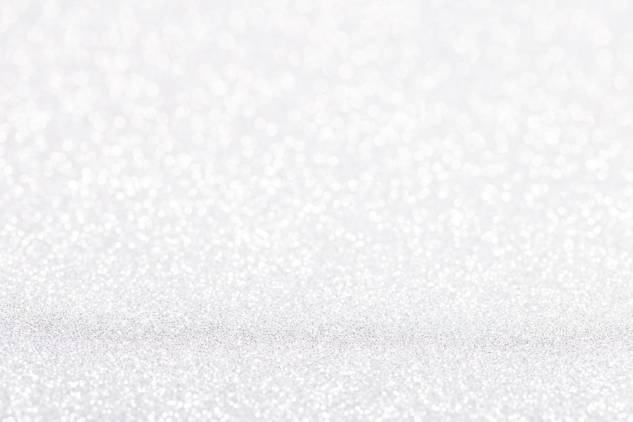 Silver white sparkle bokeh background